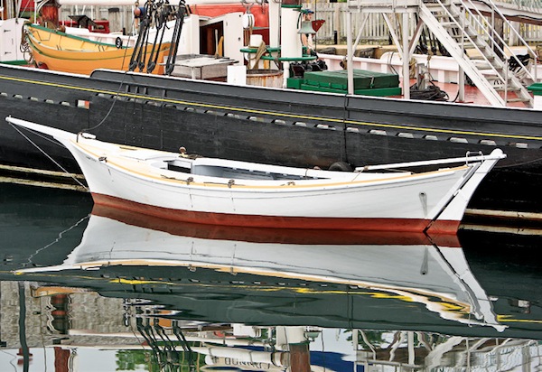 Eli Amon - Gearing up for Photo Adventures - Reflected Boat