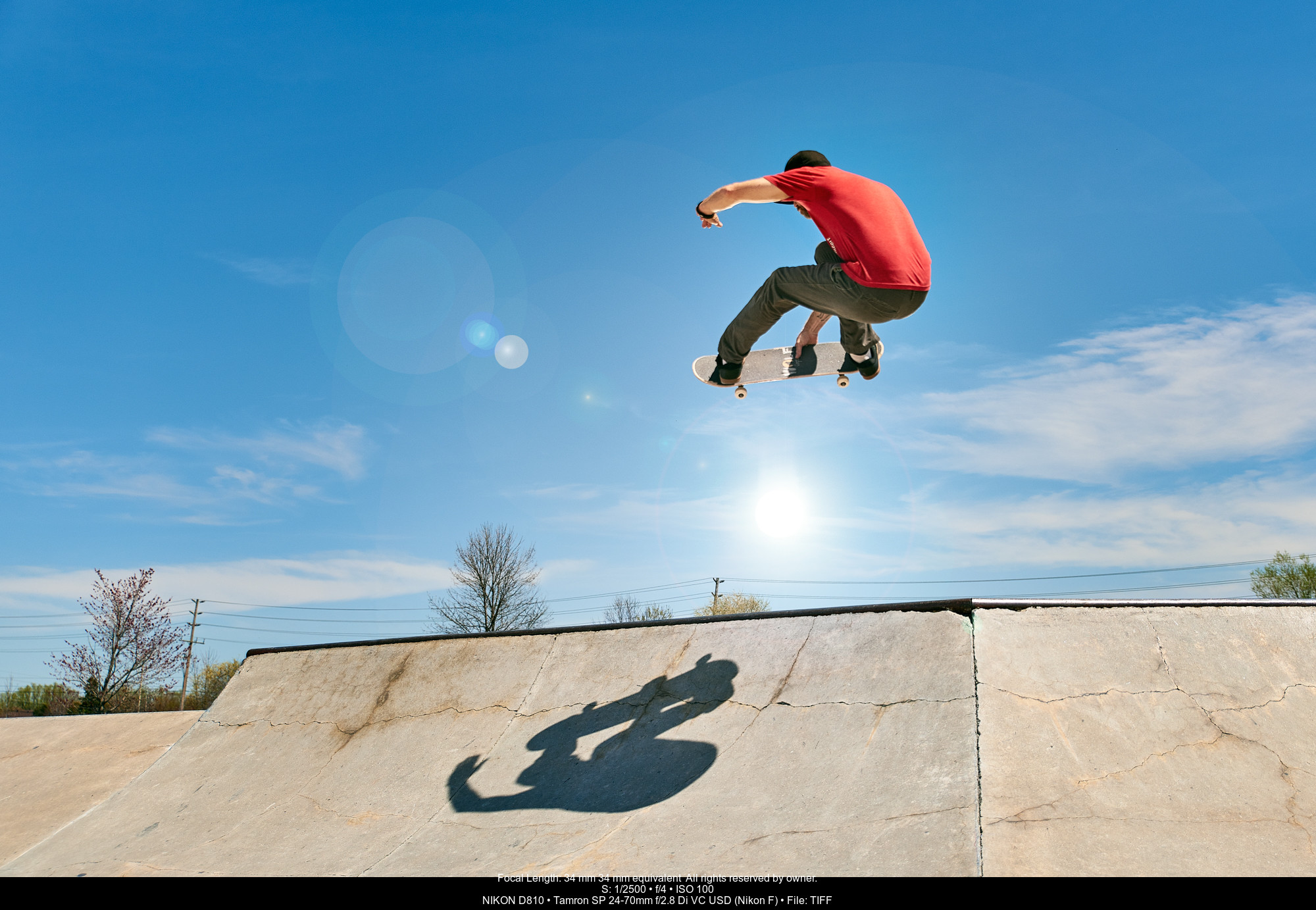 Skateboarder with Smoke Grenades - PHOTONews Magazine